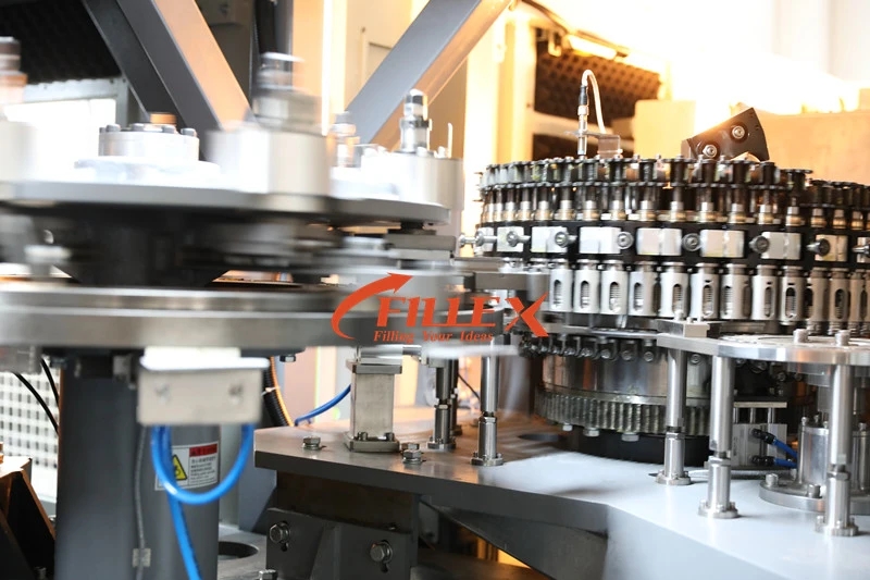 Plastic-Bottled-Pure-Water-Carbonated-Blowing-Filling-Capping-Combiblock-Machine.webp (1)